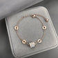 Sparkling Roman Numeral Charm Bracelet