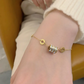 Sparkling Roman Numeral Charm Bracelet